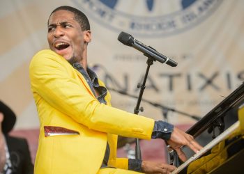 Jon Batiste, seen here at the 2014 Newport Jazz Festival, will take on a new gig as the bandleader for CBS' Late Show With Stephen Colbert.